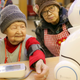Qing Zhang getting examined by a robot.